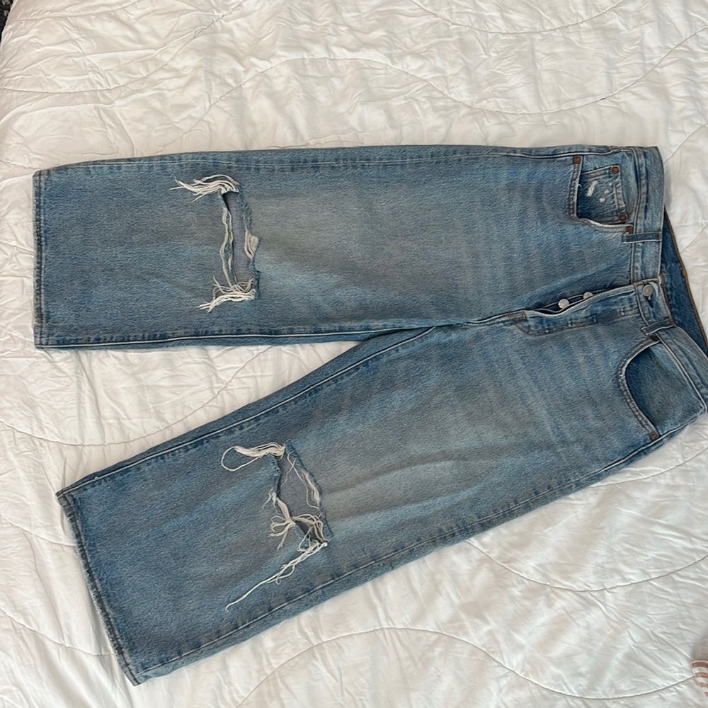 Levi’s rib cage ankle light denim with frayed knees